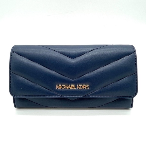 Michael Kors Large Trifold Wallet Navy Blue
INWT
(NWT) - Picture 1 of 8